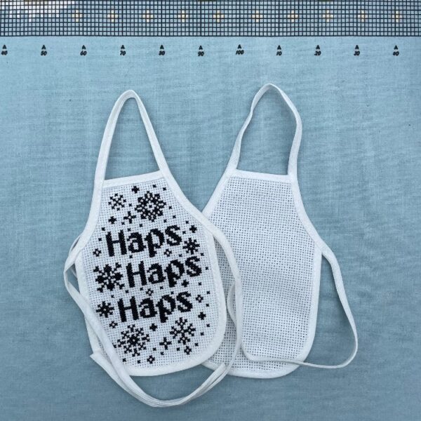 Broderist flaskeforklæde